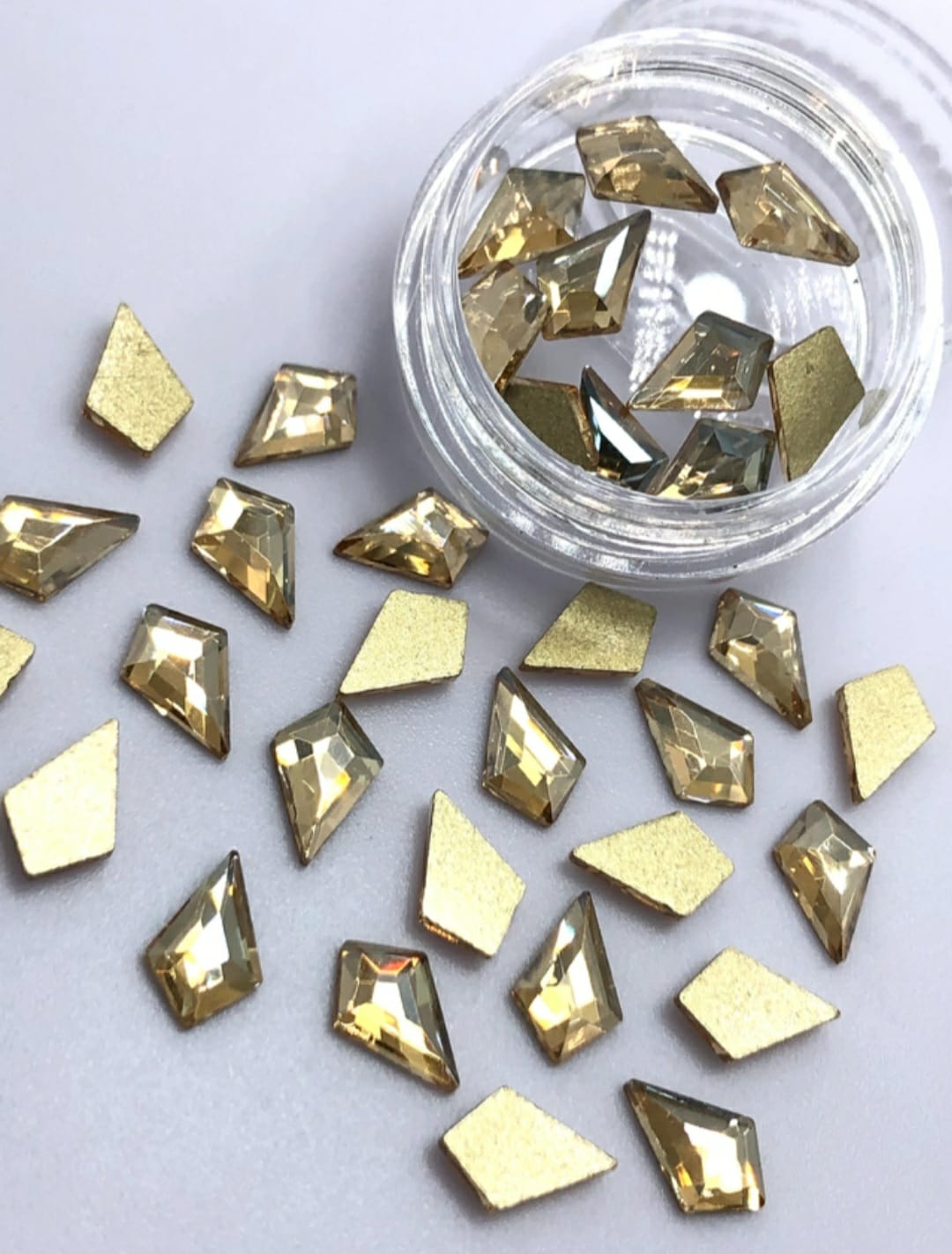 CRISTAL FLECHA 5X8MM (10 UNIDADES) CHAMPAGNE